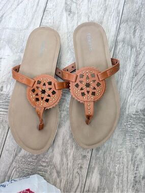 torrid Tan Cutout Medallion Thong Sandals
